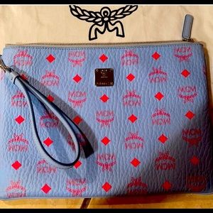 Mcm baby blue and pink Bella clutch